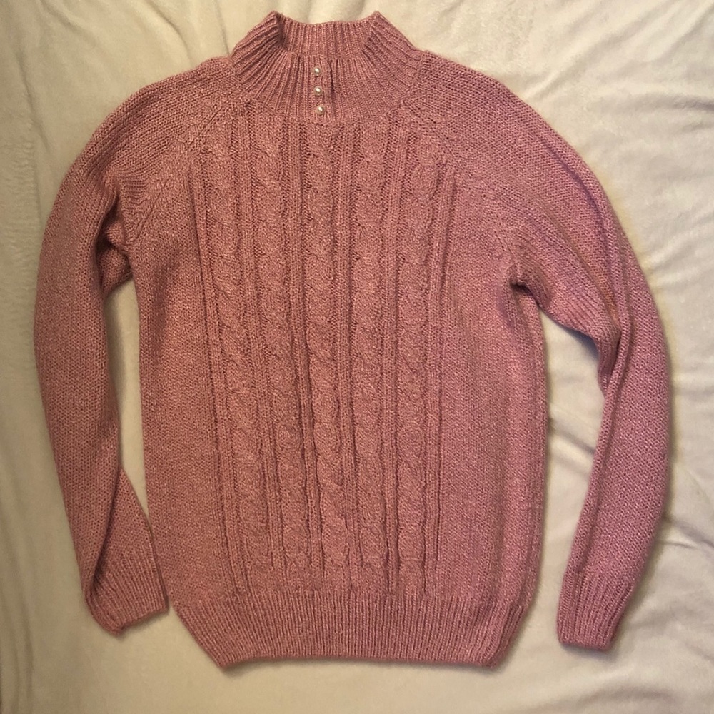 Pink cable knit turtleneck with pearl accents